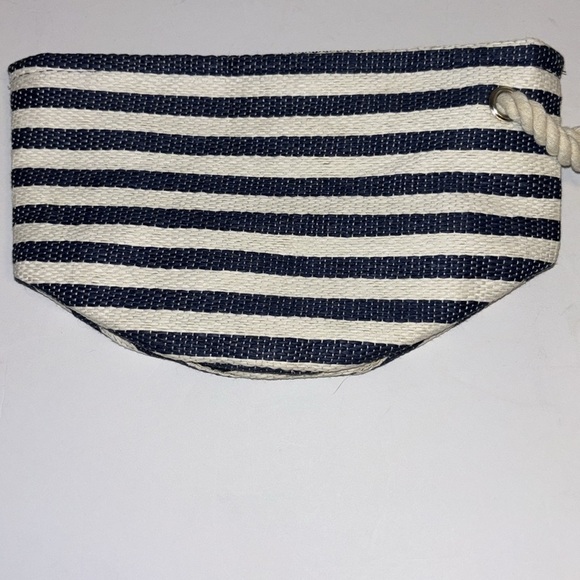 Macy's Navy and White Striped Wristlet
Straw like clutch Super Cute - Picture 4 of 7